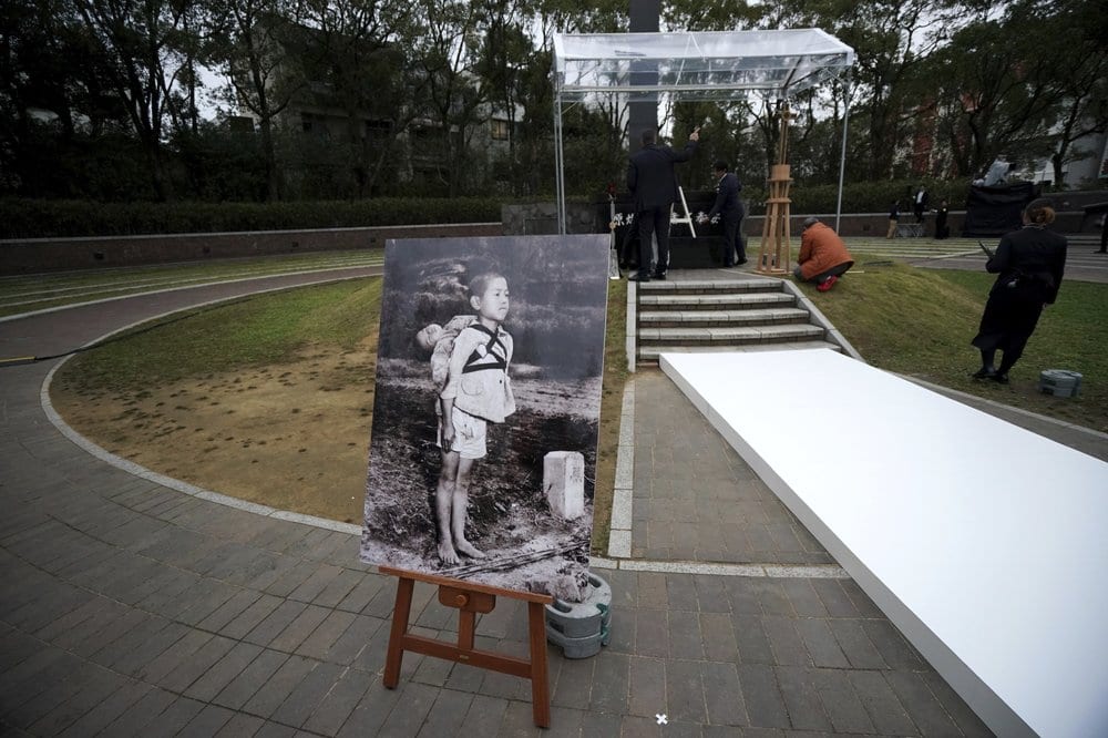 Son of Marine photographer meets pope in Japan