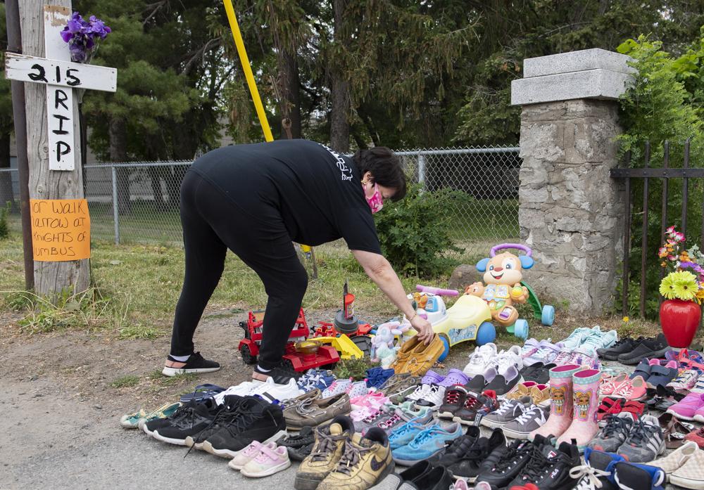 Canada lowers flags after discovery of bodies at school site