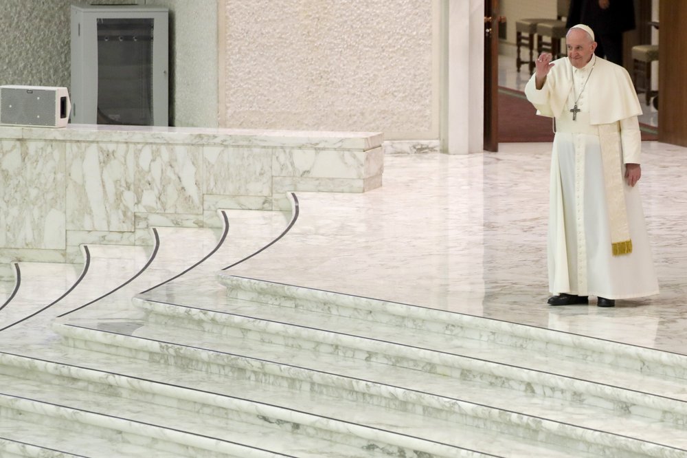 Pope apologizes for keeping distance as virus cases spike