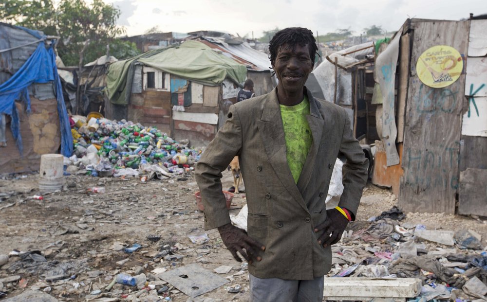 Brazilian priest develops recycling project for Haiti’s sea of garbage