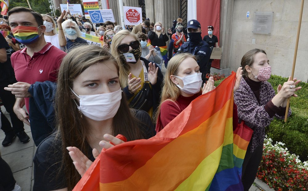 Poland trial starts over LGBT symbol on revered icon posters