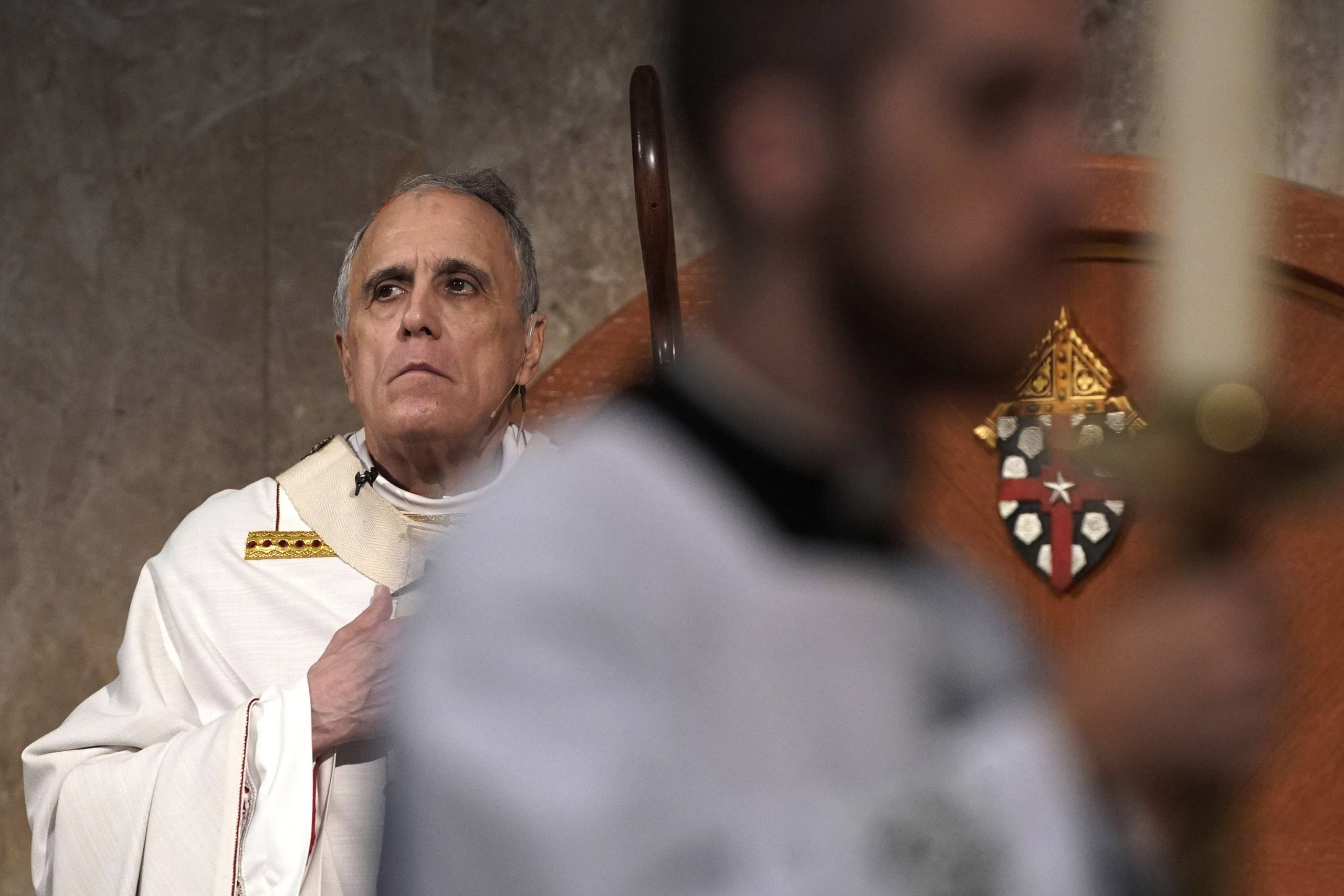 Allegations against top priest under review after report