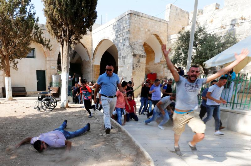 West Bank priests stress nonviolence as youths protest Israeli occupation