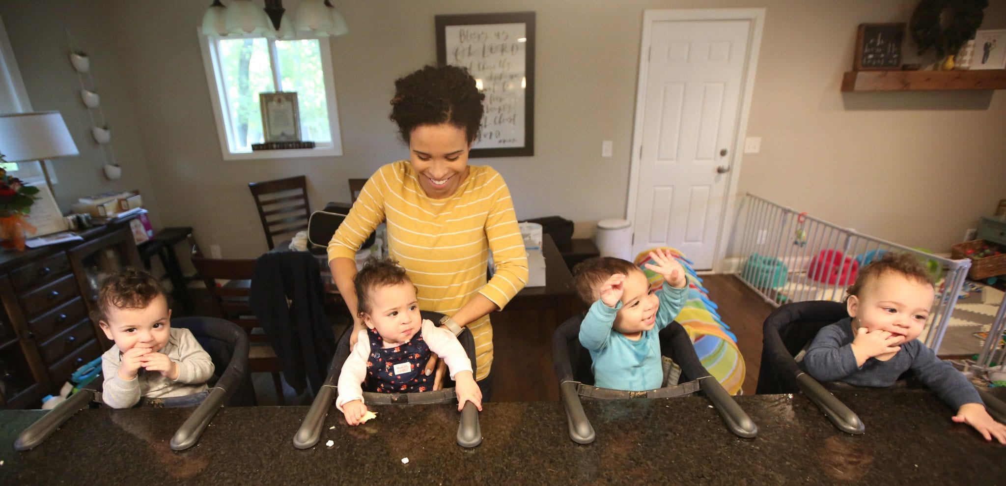 Parents of year-old quadruplets get challenges, smiles times four