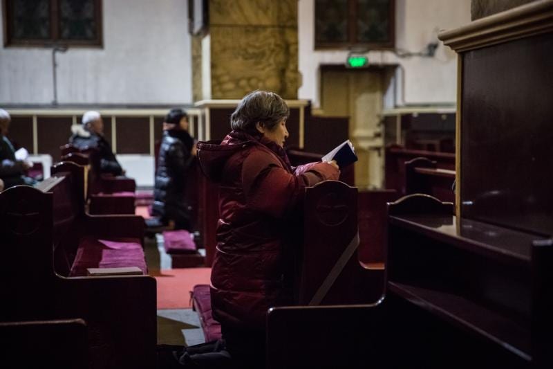 Some Chinese Catholics see restrictions as new religion rules take effect