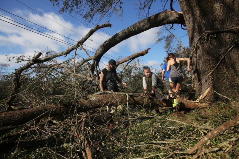 Before Thanksgiving, Miami parish makes pilgrimage to hurricane zone