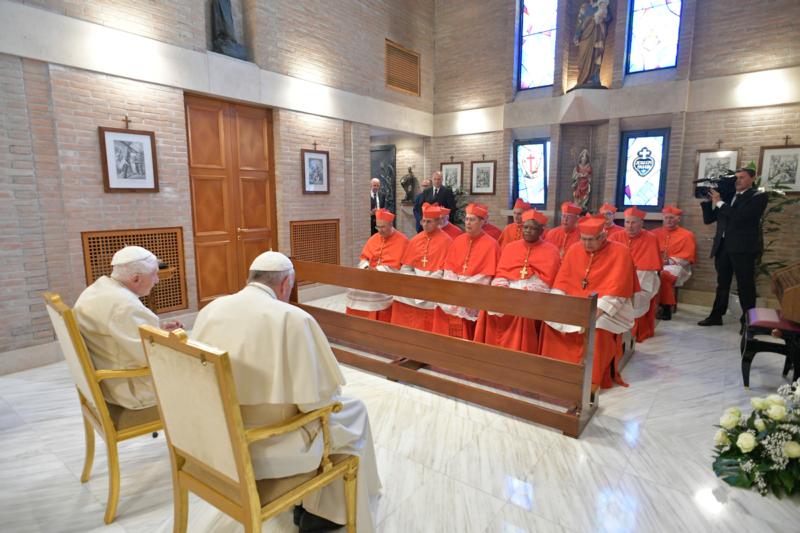 Benedict is defending celibacy from the media, not from Francis