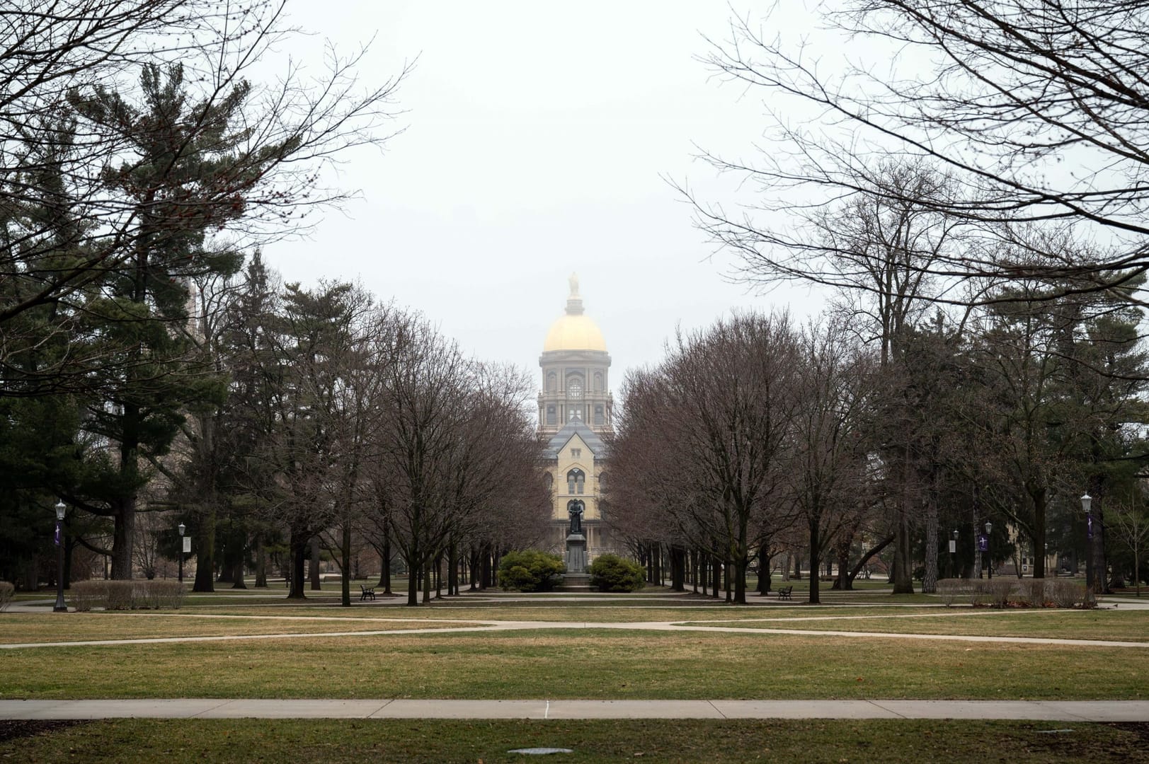 Notre Dame suspends classes after surge of COVID cases