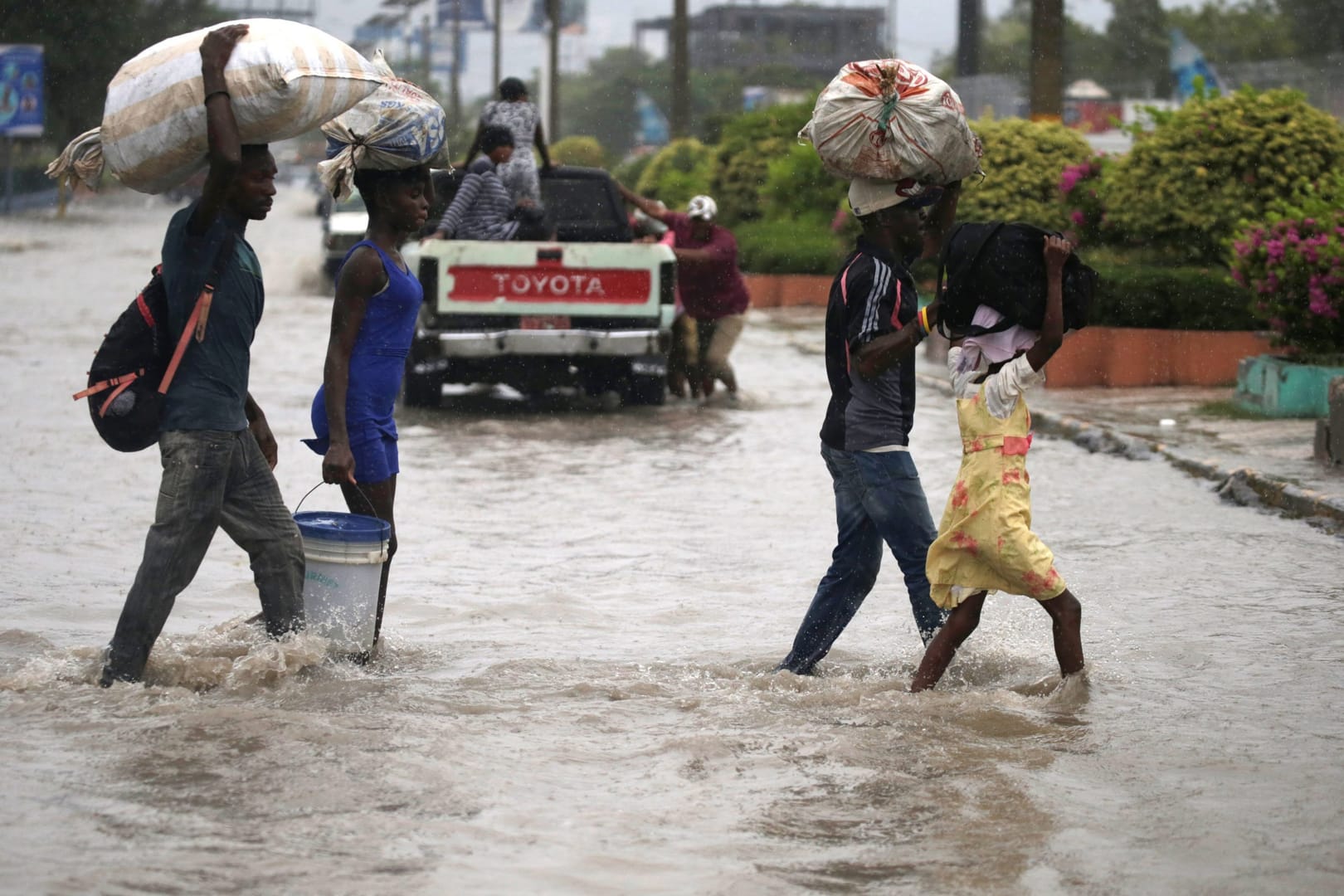 At least 12 dead as tropical storm lashes Haiti, Dominican Republic