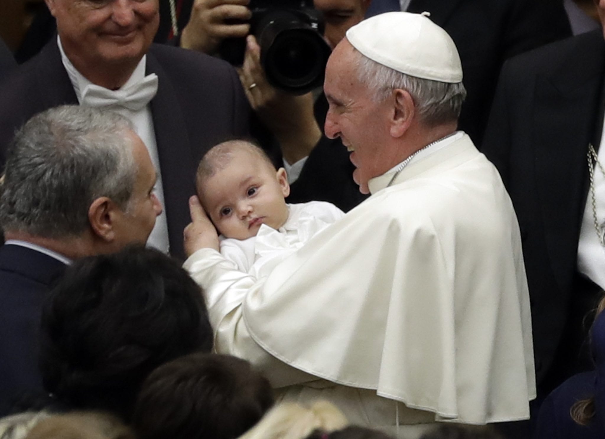 Whirlwind of a pope takes up grandparents, kids, Milan and Haiti