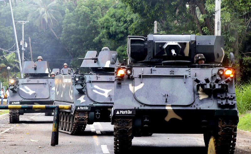 12 dead as Philippine troops battle Muslim militants in south