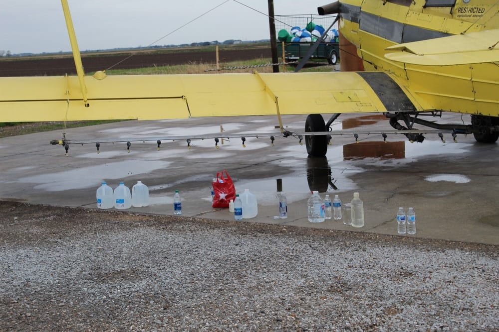 It’s raining blessings! Crop duster drops holy water on town
