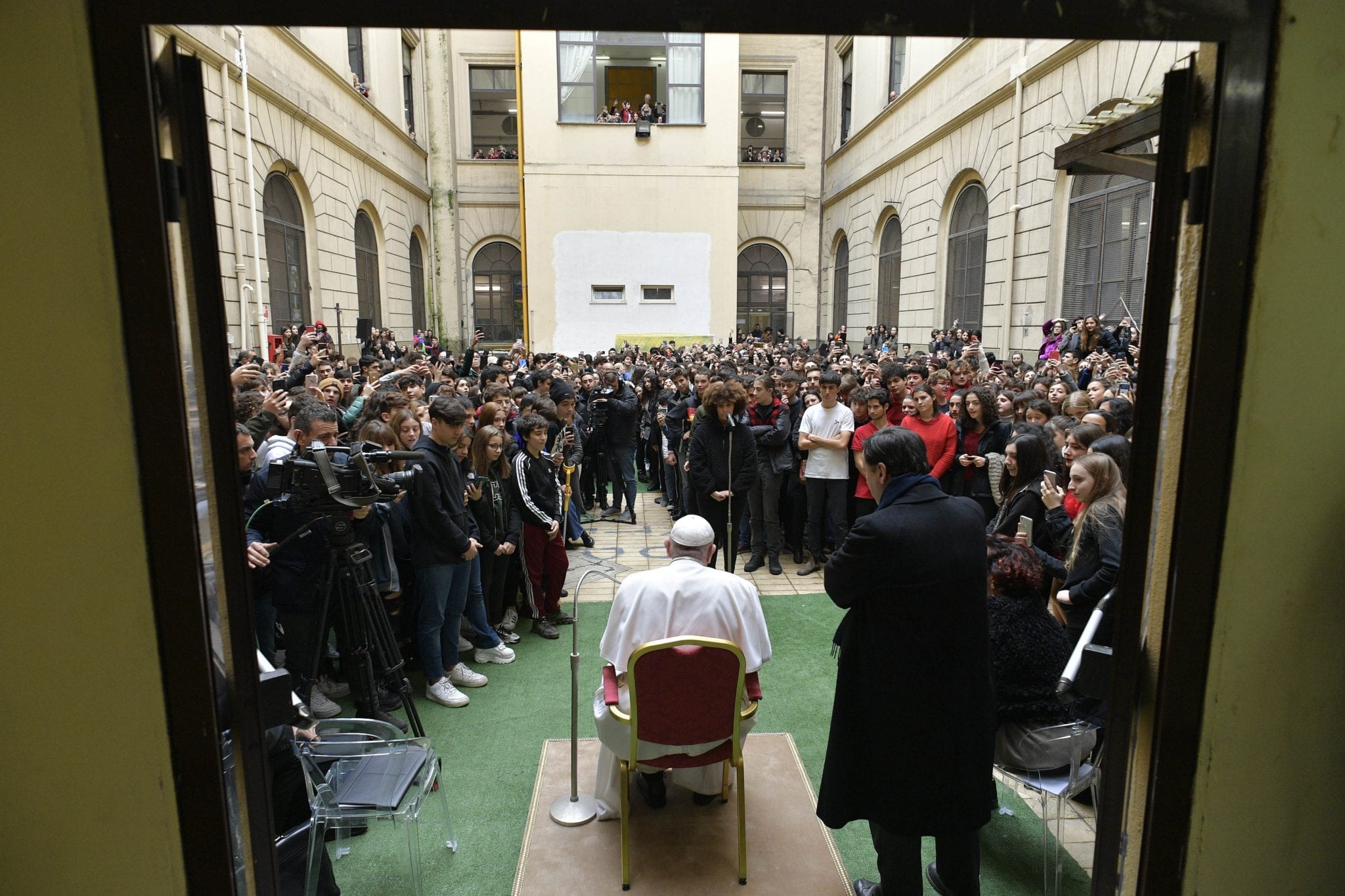 Before the bell: Pope pays surprise visit to Rome high school