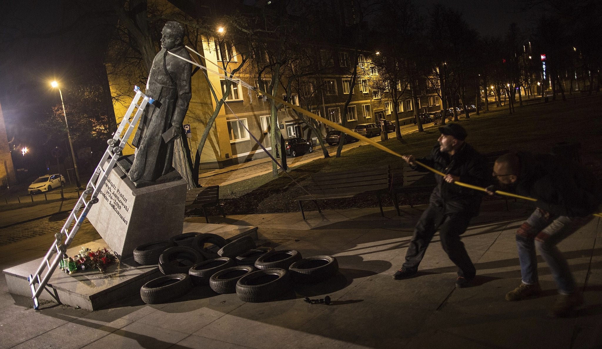 Man charged for toppling statue of Polish priest over abuse