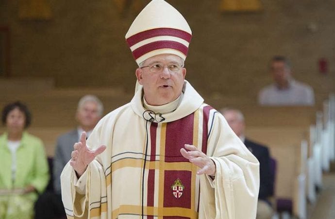 Bishop urges victims to come forward after priest charged