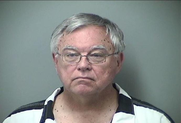 Police raid Michigan diocese while priest faces sex charges