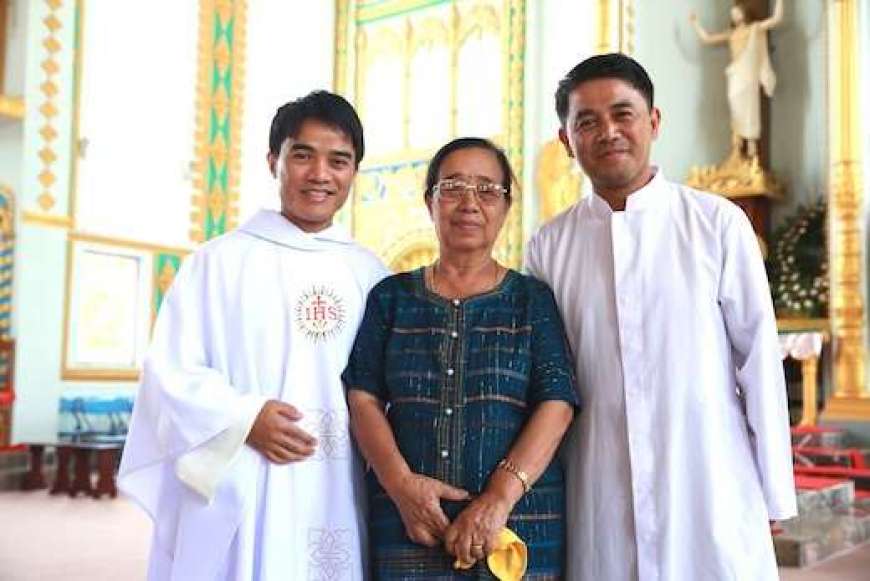 Pope Francis visits with first Burmese Jesuit priest