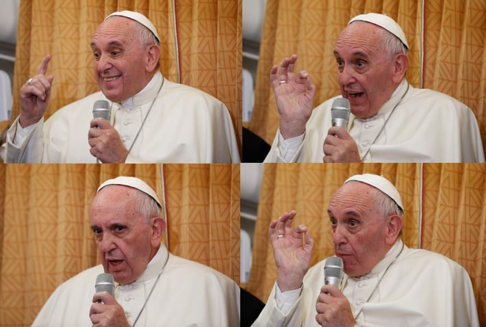 Pope Francis answers questions from journalists aboard his flight from Baku, Azerbaijan, to Rome Oct. 2. (Credit: CNS photo/Paul Haring.)