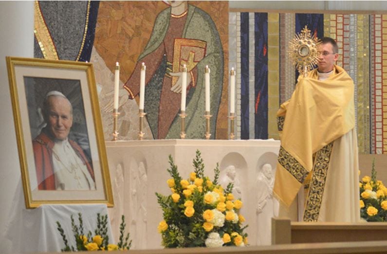 At JPII National Shrine, late pope’s ‘face’ reflected in his people