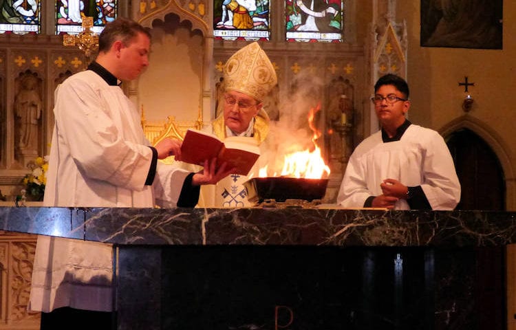 Bishop re-dedicates altar two months after satanic attack