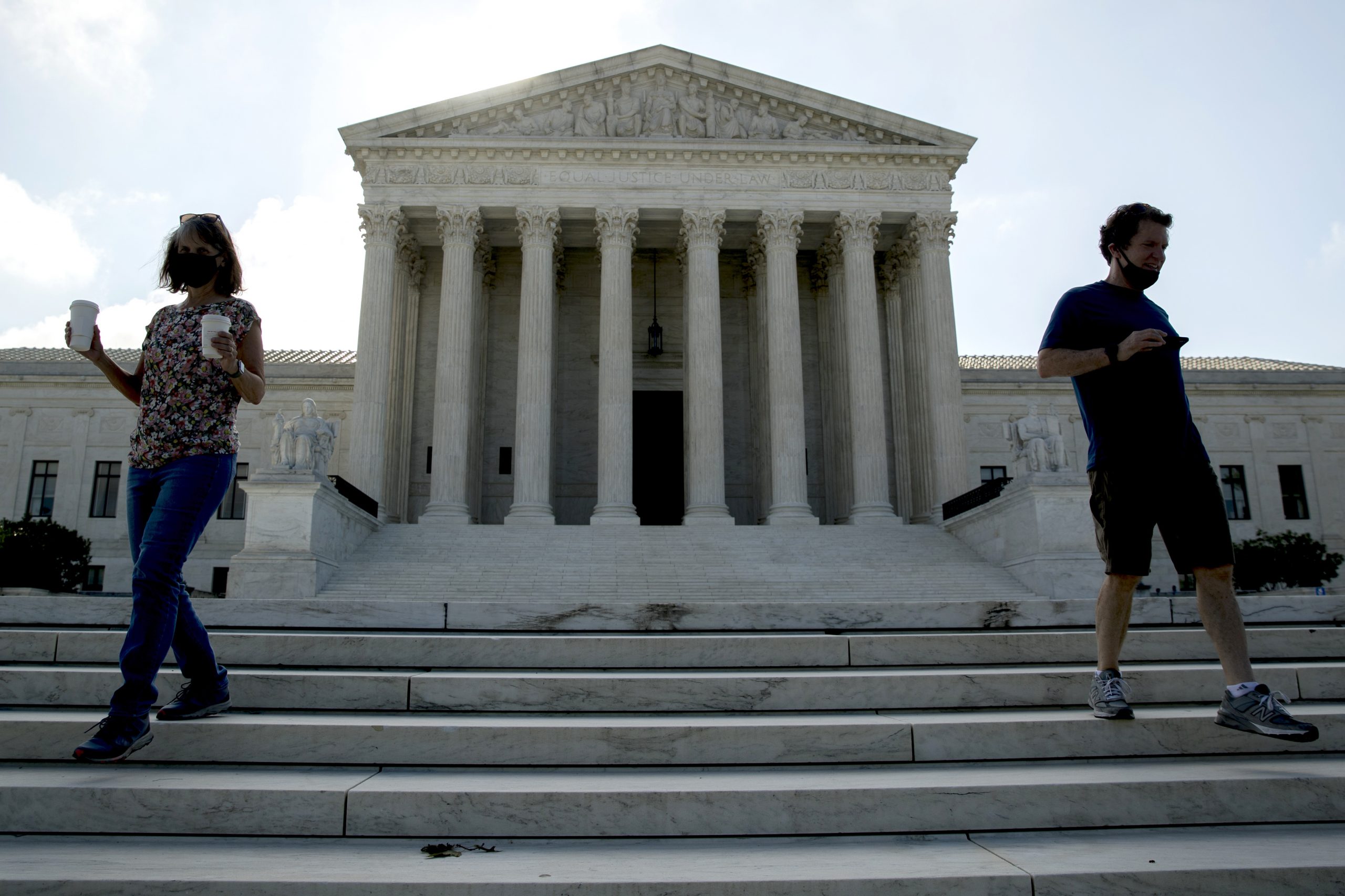 Thomas spoke, Roberts ruled in unusual Supreme Court term