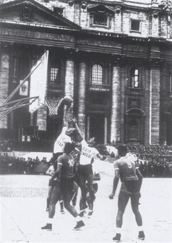 A basketball game is played in St. Peter's Square at the Vatican in the presence of Pope Pius XII in 1955. (Credit: CNS photo/Vatican's Pontifical Council for the Laity.)