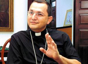 Auxiliary bishop serving top papal aide resigns after sex misconduct allegations