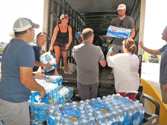 Caravan of Louisiana parishioners takes supplies, hope to Harvey victims