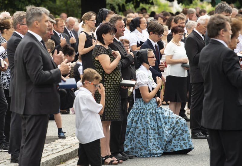 German Catholics attend Corpus Christi parades
