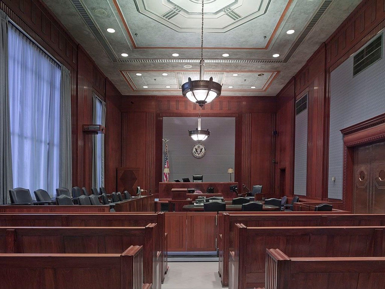 Church immigration aide gets prison for defrauding people