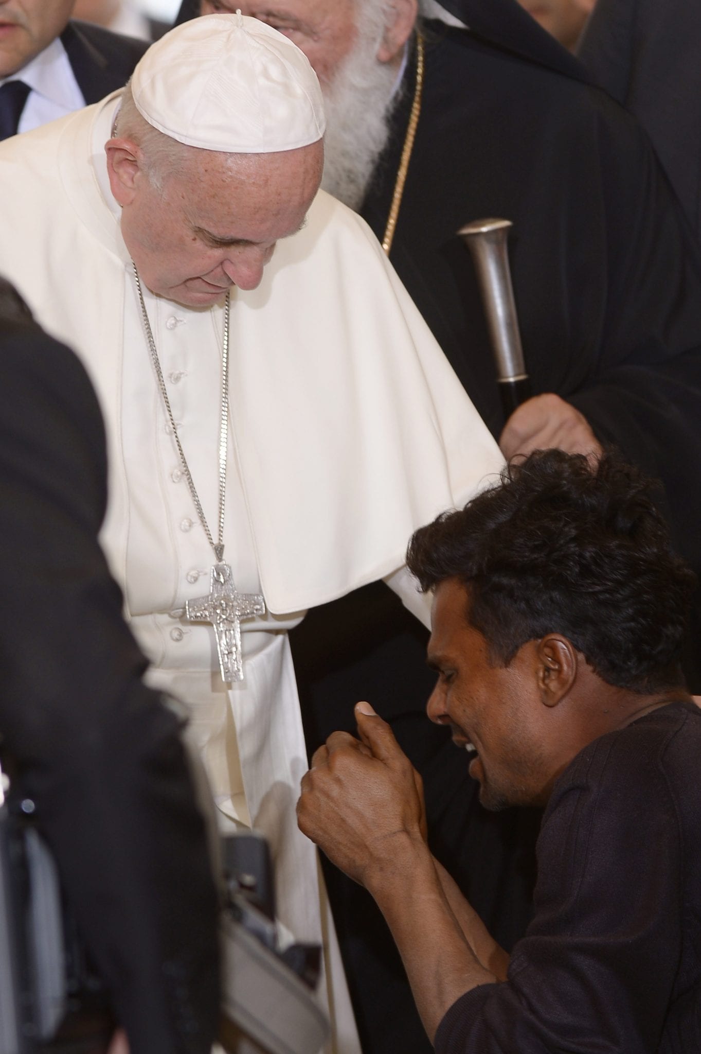 Refugees in Greece overwhelmed by pope&#039;s visit