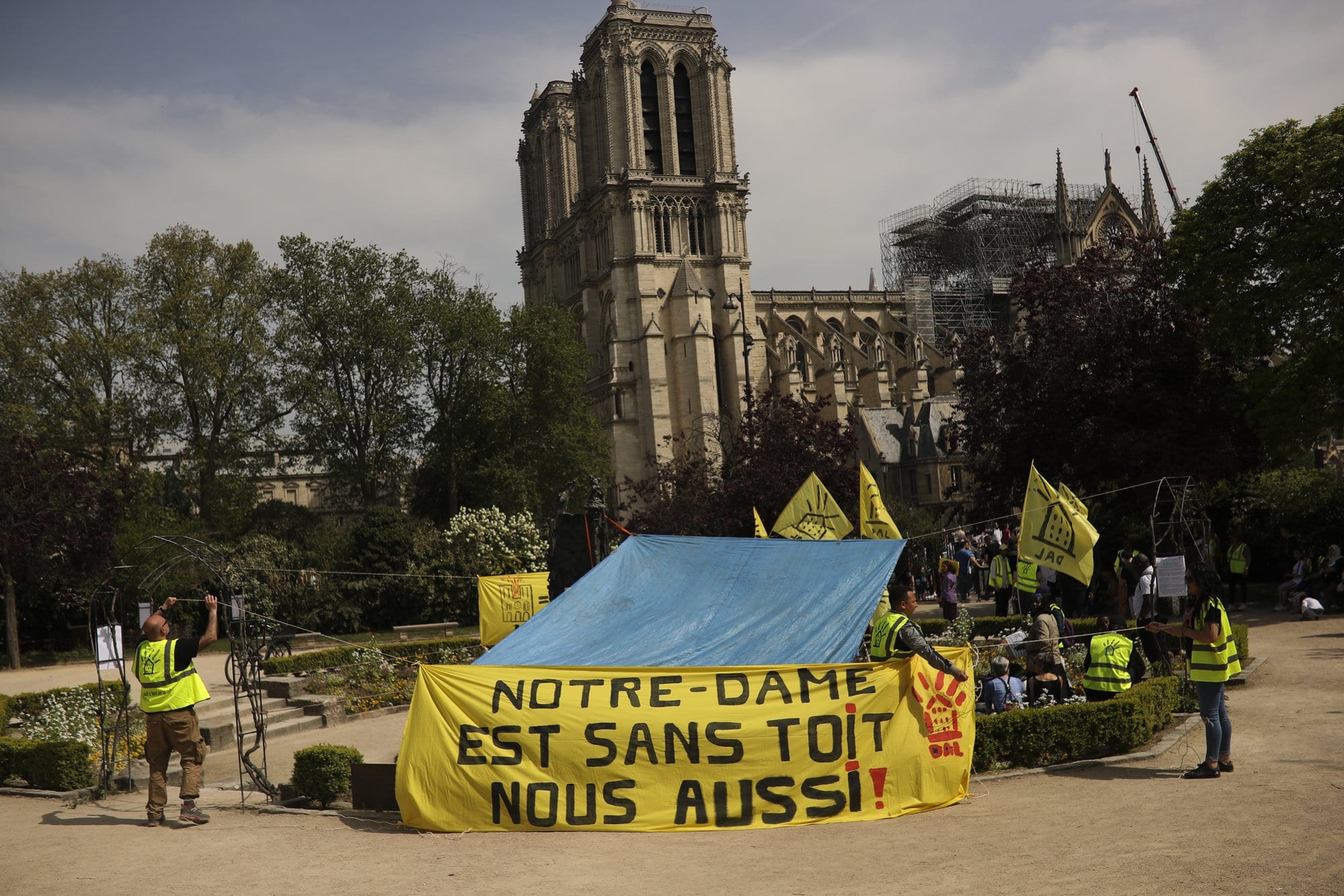Homeless activists outside Notre Dame demand ‘a roof too’