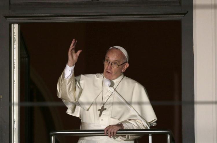 Pope uses Krakow’s most famous window to talk suffering