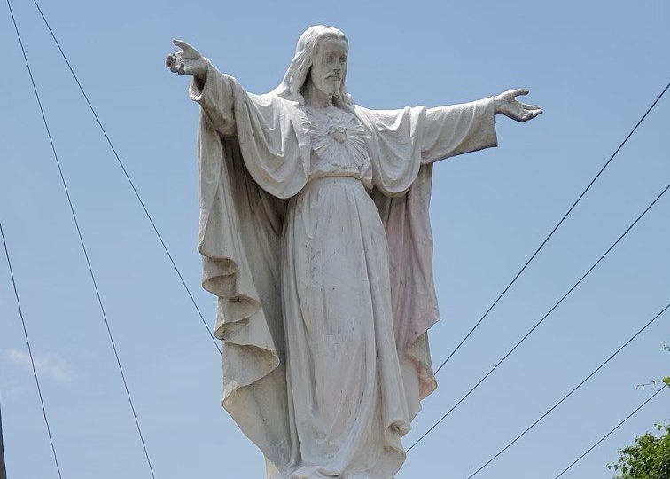 Basilica quickly restores Christ statue after it’s covered with red