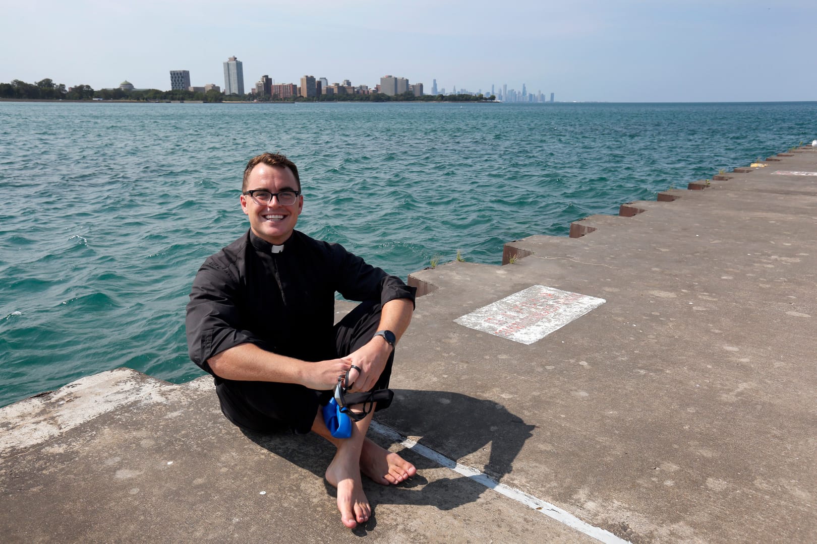 Jesuit brother’s Lake Michigan swim raises funds for Cristo Rey school