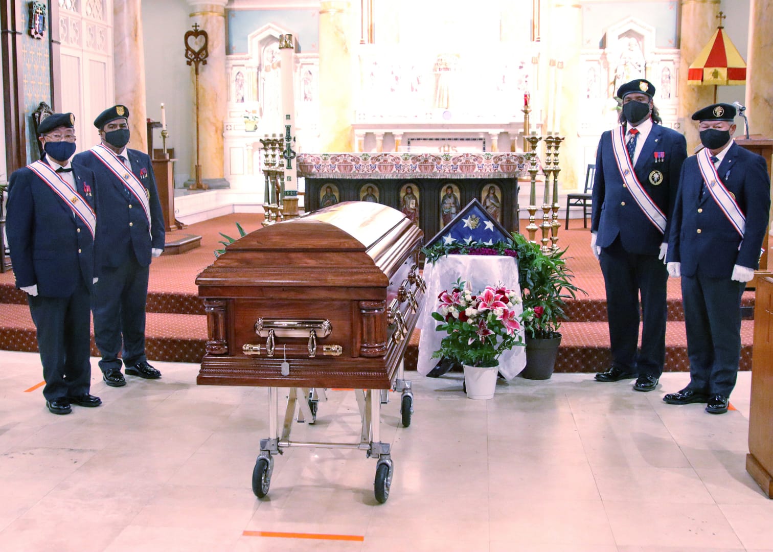 Hawaii Mass is send-off for remains of war-hero priest to return to Kansas