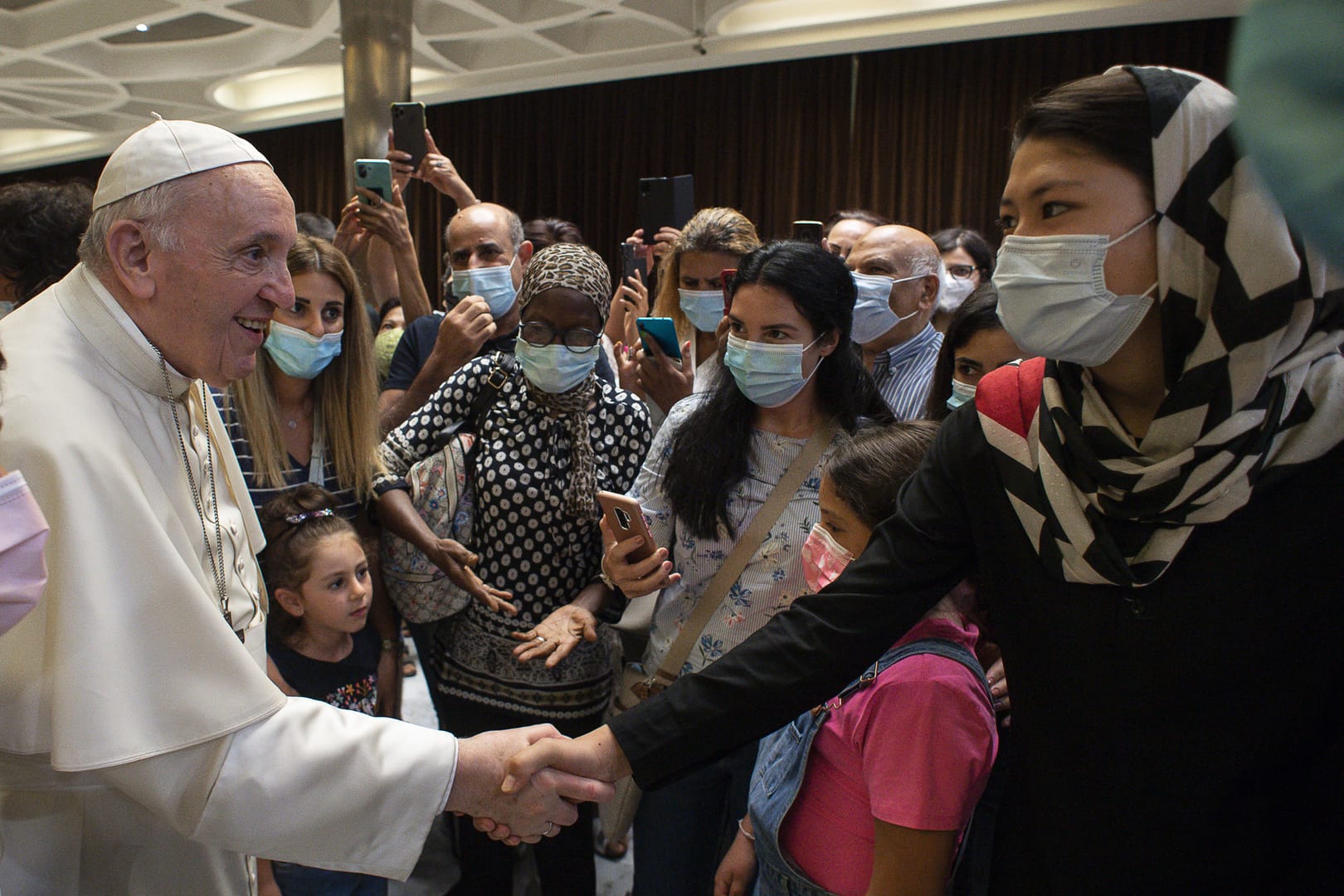 Pope attends screening of controversial film with his civil union comments