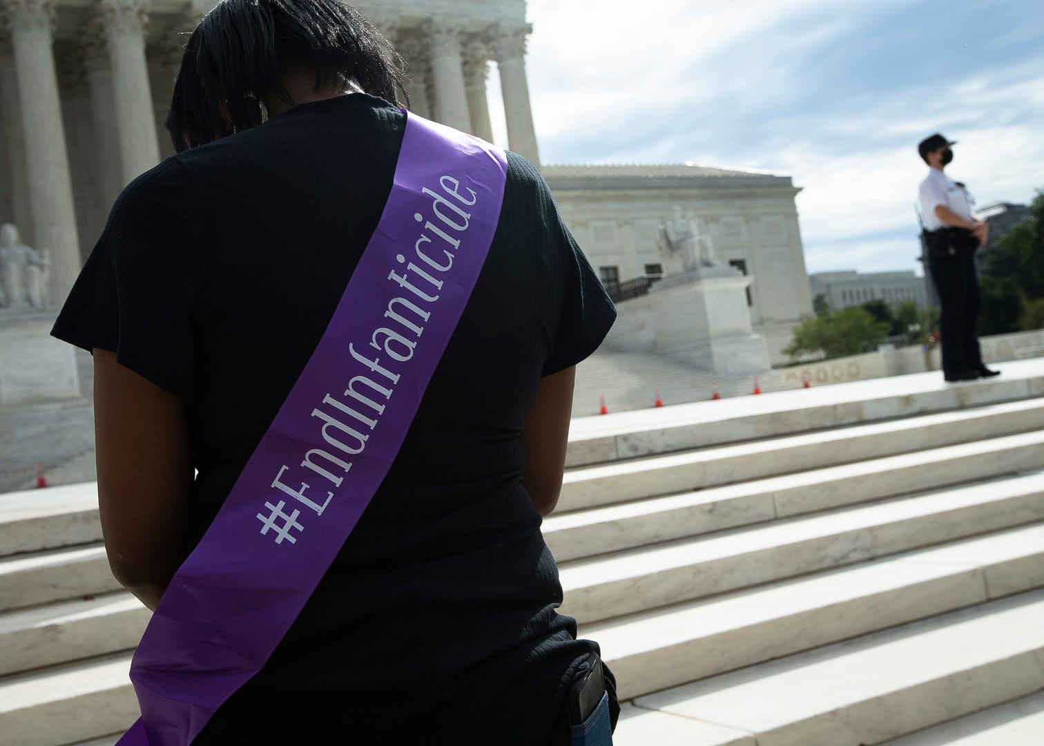 Supreme Court keeps Texas abortion law in place, says it will review it