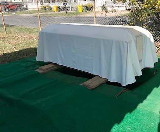Group burial of urns provides opportunity for closure for loved ones