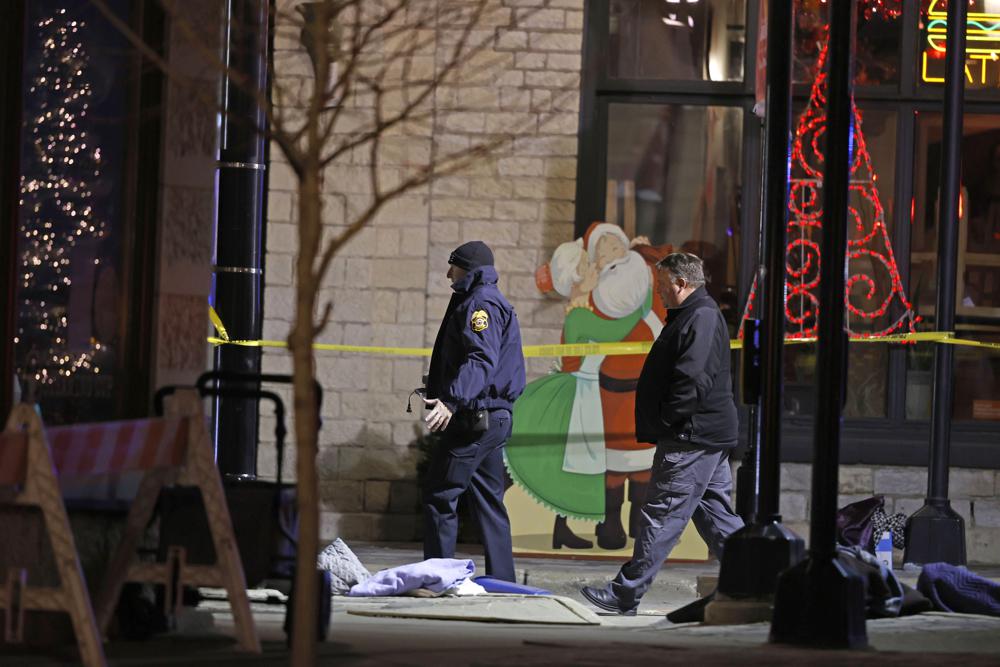 SUV driver in parade crash may have been fleeing a crime