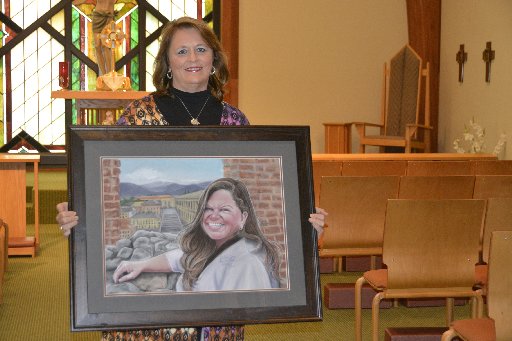 Artist deepens faith by painting portraits for those suffering sudden loss