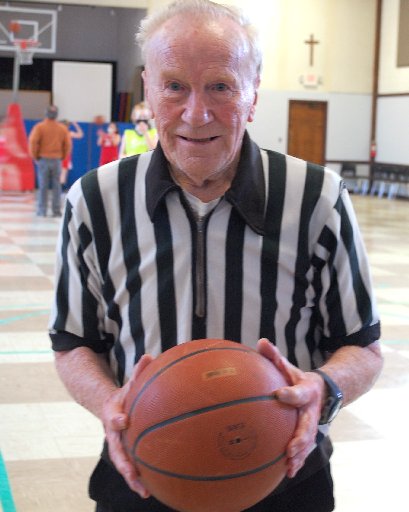 As referee, retired educator, 89, helps players learn about sport and life