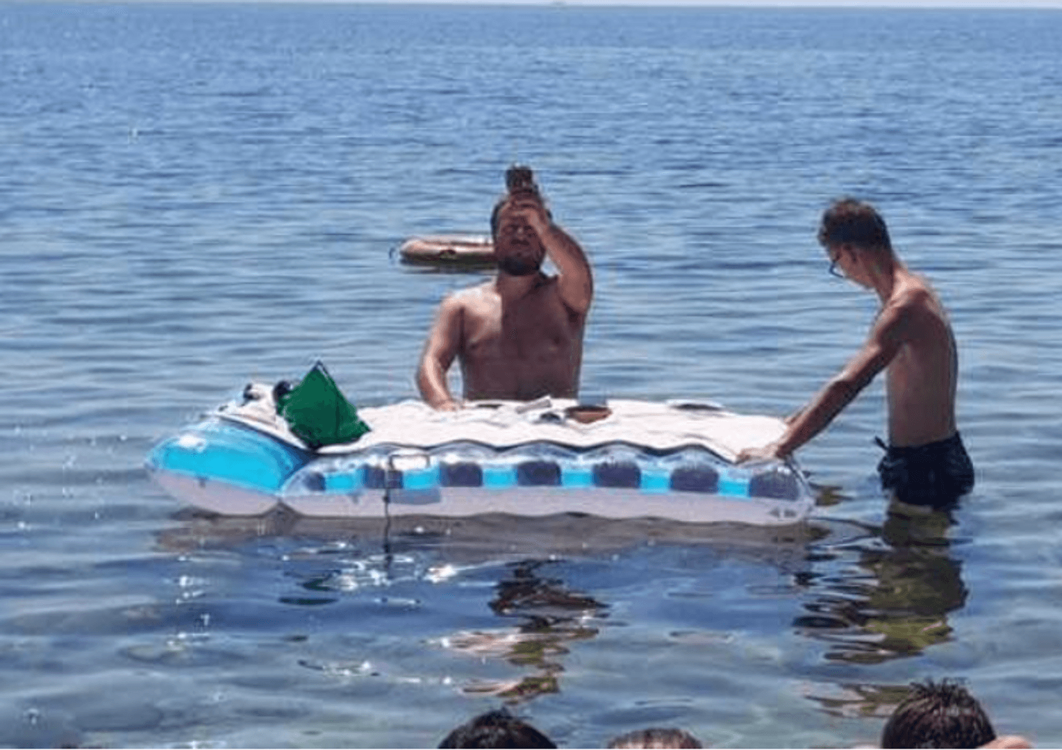 Should beating the heat by saying Mass at the beach (in the water) be a crime?