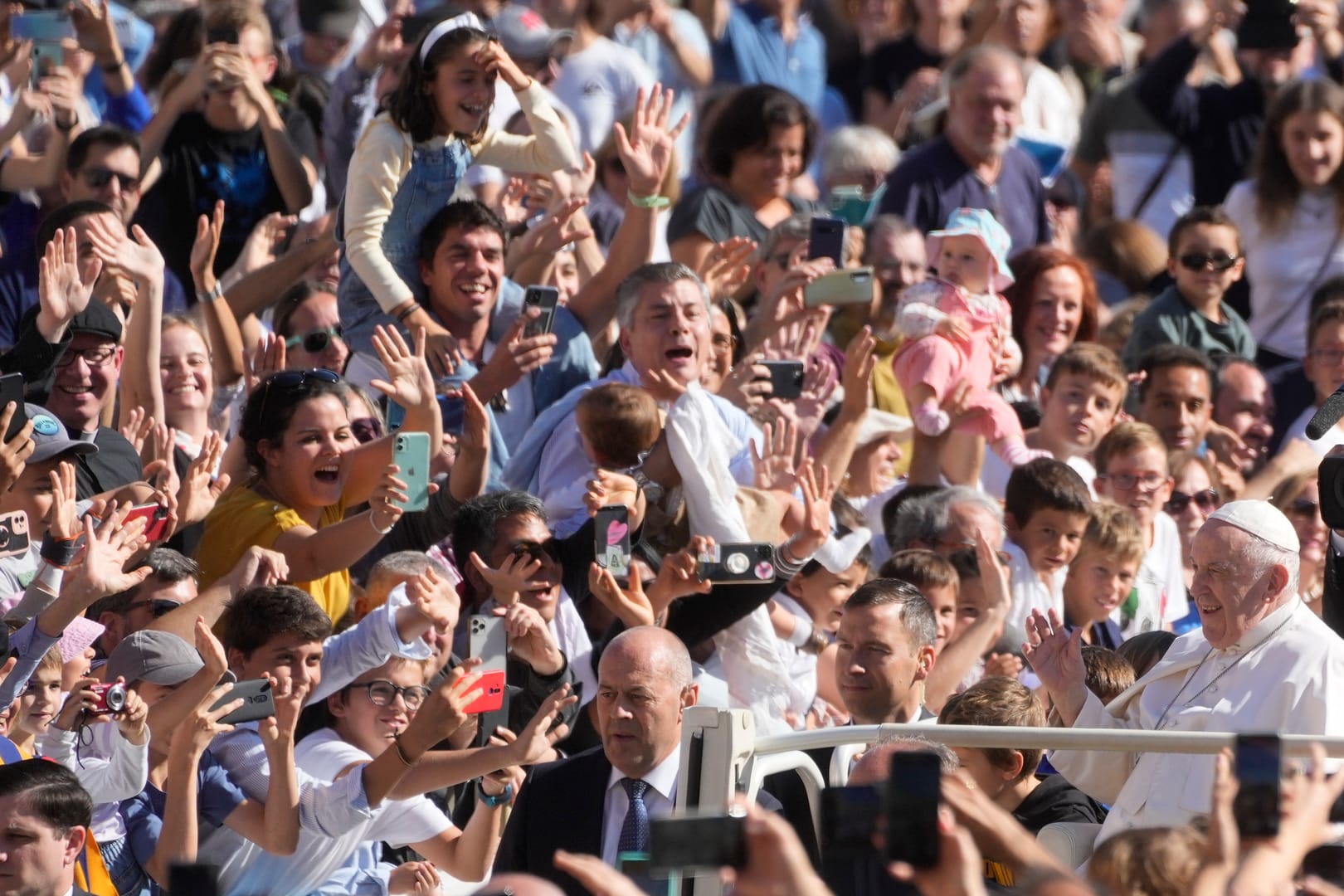 Pope gives pep talk to big lay group after tightening rules