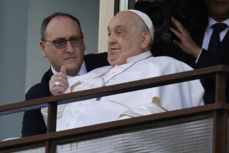 Pope continues to improve, but Easter plans still unclear