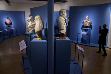 A journalist photographs marble statues by Italian Baroque master Gian Lorenzo Bernini, during the press preview of the exhibition "Bernini and the Barberini" at Palazzo Barberini in Rome on Feb. 11, 2026. (Credit: Domenico Stinellis/AP.)