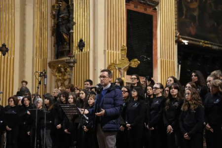 Father Stefano Guidi, head of the Archdiocese of Milan’s Service for Oratories and Sport, addresses attendees during a concert at the church of Sant’Antonio Abate in Milan, Italy, on Feb. 18, 2026. (Credit: María Teresa Hernández/AP.)