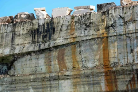 A wall of sectioned travertine is seen at the Degemar quarry near Tivoli, Italy, on Friday, Feb. 13, 2026, where 17th-century Baroque architect Gian Lorenzo Bernini selected travertine for the colonnade of St. Peter's Square. (Credit: Gregorio Borgia/AP.)