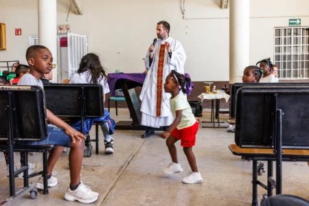 Father Brian Strassburger speaks during Mass at Casa del Migrante on Thursday, March 19, 2026, in Reynosa, Mexico. (Credit: Michael Gonzalez/AP.)