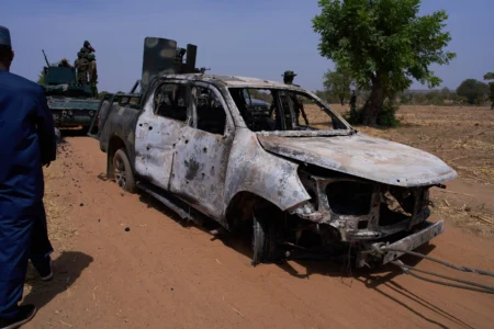 Militants in northern Nigeria kill 10 security forces and 1 resident, officials say